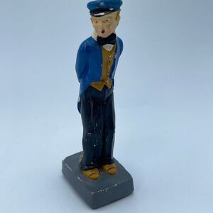 1920’s 30’s chalk ware piece Man holding flowers